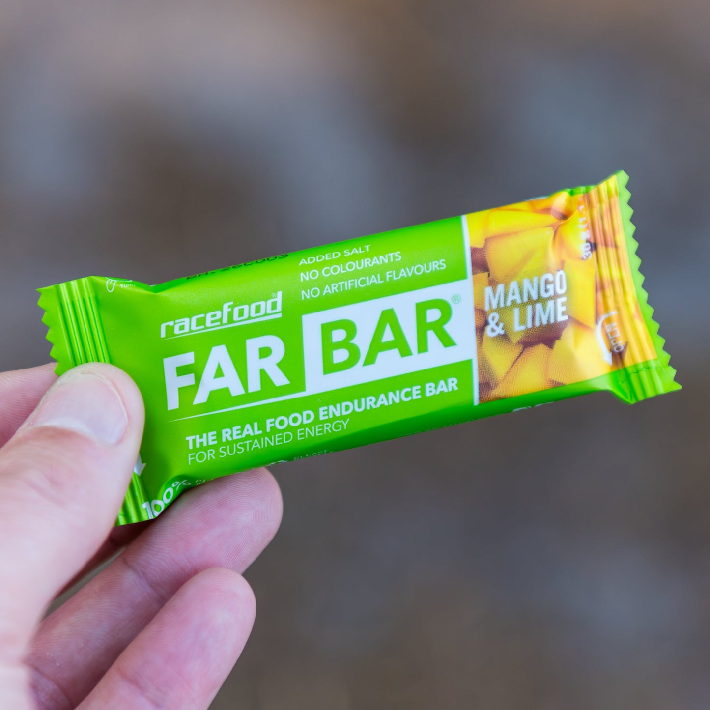 Racefood Far Bar Mango & Lime held in hand
