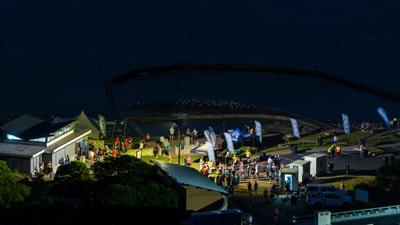 Race event aid station at dusk