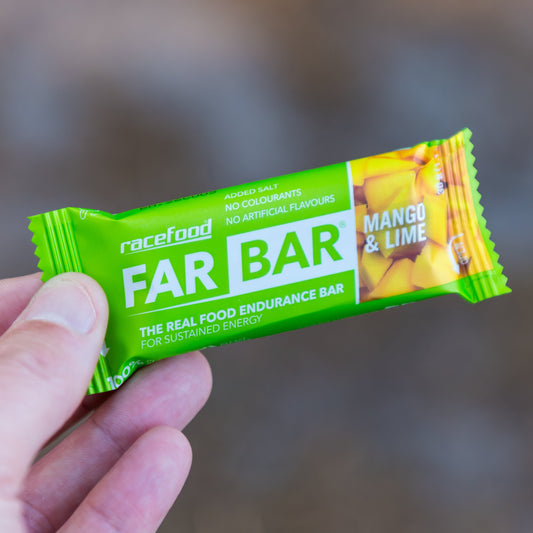 Racefood Far Bar Mango & Lime held in hand